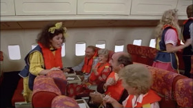 - Please, we'll have to exit immediately. This is an emergency.
- Darling, we did not pay for first class tickets to slide down a moldy chute into a raft.
- I can't go without my rubber ducky.
<...>
- Beat me, whip me, make me write bad checks, but please join us for a glass of bubbly.