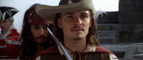 - On our return to Port Royal, I granted you clemency. And this is how you thank me? By throwing in your lot with him? He's a pirate.
- And a good man. If all I've achieved here is the hangman will earn two pairs of boots instead of one, so be it. At least my conscience will be clear.
- You forget your place, Turner.
- It's right here, between you and Jack.